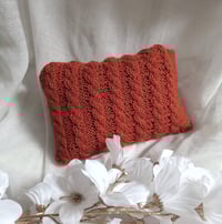 Image 2 of Newborn  photoshoot knitted set | pillow and bonnet | rusty orange