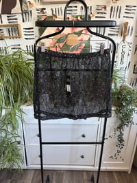 Image 1 of Fashion Nova black see thru skirt 