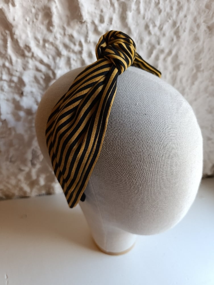 Image of Cerchietto a fascia a righe giallo/nero