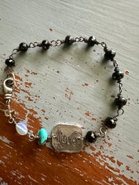Image 11 of faceted gemstone and sterling silver medallion bracelet