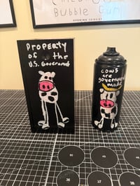 Image 1 of Cows are government made spray paint can