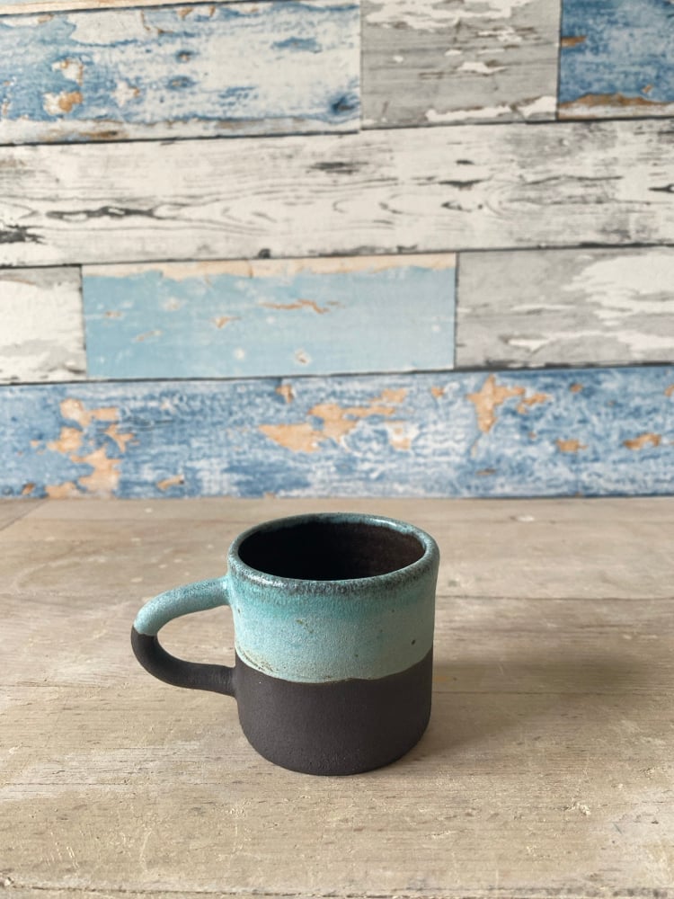 Sea blue black clay.
