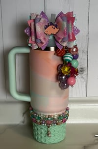Image 1 of Warm Serene Brushstrokes Dinosaur Tumbler Accessory Set | Bow, Straw Bauble & Bracelets