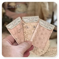 Image 6 of snippet book snippet roll in a vintage style button box