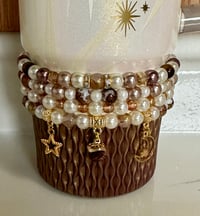 Image 1 of Starlight Shimmer Gold, Champagne, and Cream Tumbler Bracelet Stack
