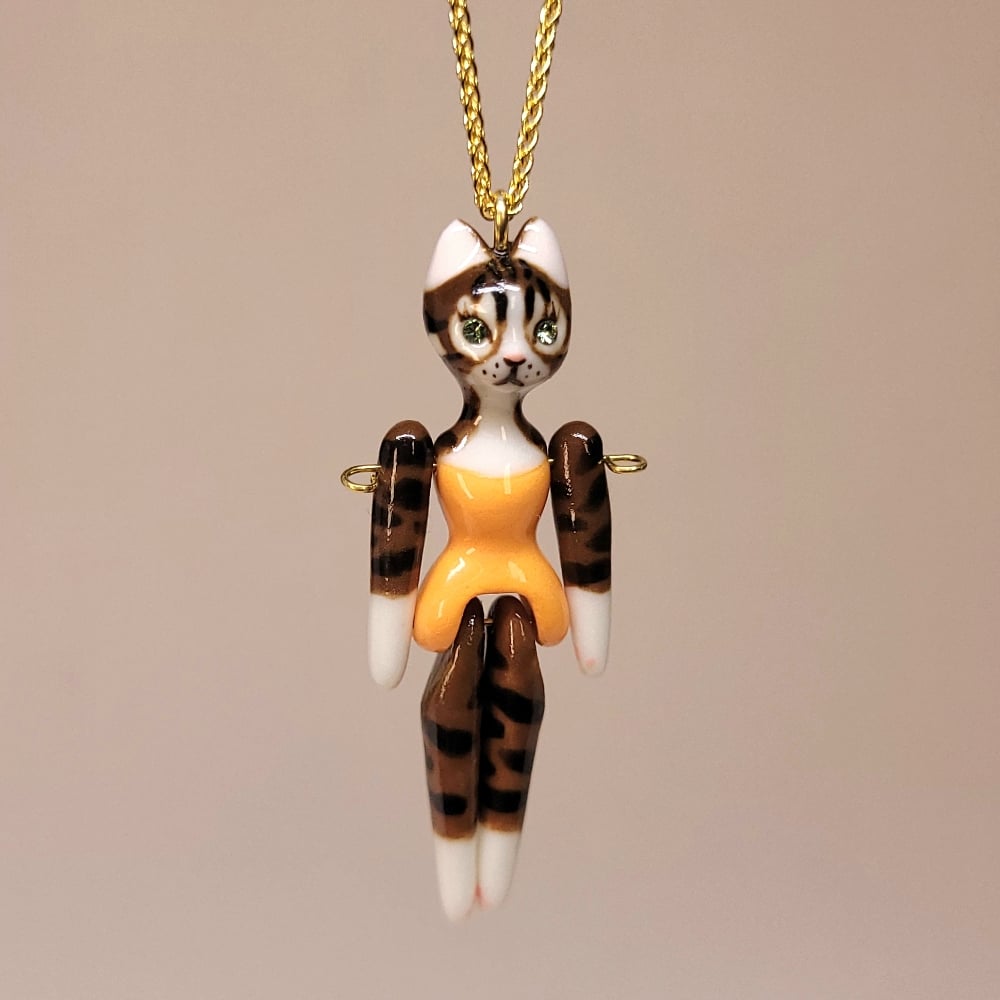 Image of Dark Brown Tabby Porcelain & Gold Vermeil Articulated Doll Pendant
