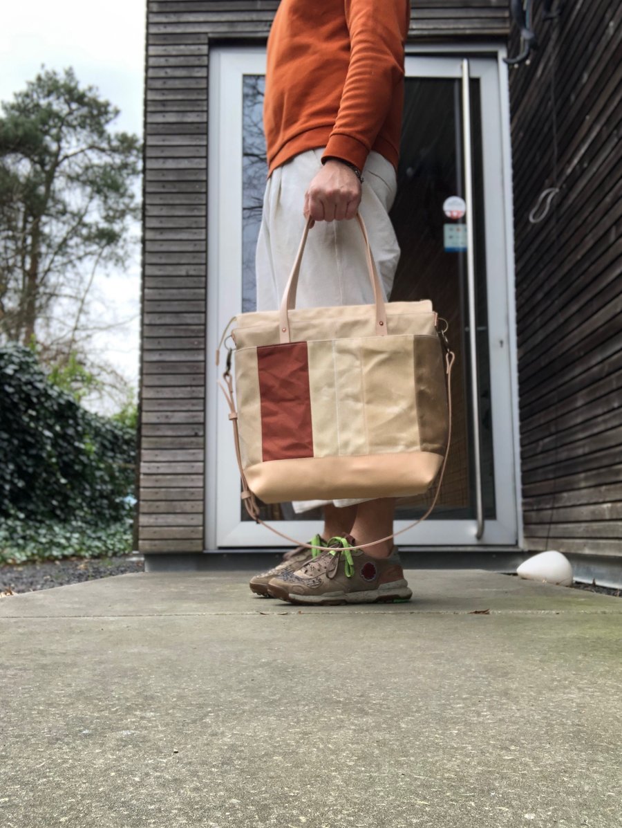 Image of  Large tote bag in waxed canvas and leather with cross body strap 