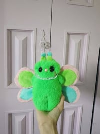 Image 1 of green butterfly