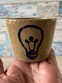 Image 3 of Navy candle tub.