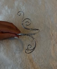 wired arm cuff 