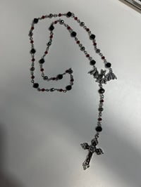 Image 1 of red and black bat rosary