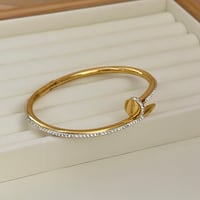 Image 1 of Gold Nail Bracelet with white and stones 19cm