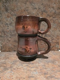 Image 1 of Bronze Mugs With Black Feet