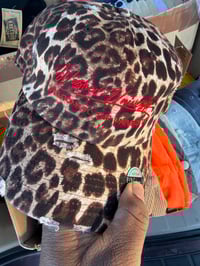 Leopard hat with red stitching 