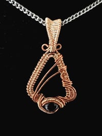 Image 1 of Hessonite Garnet Wire Wrap