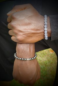 Image 1 of Hematite and Onyx Bracelet Collection