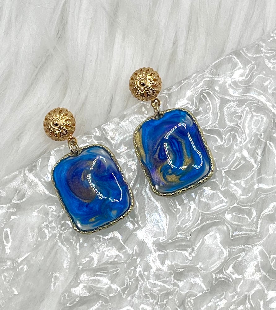 Image of PAINTED BLUE SWIRLED DANGLES