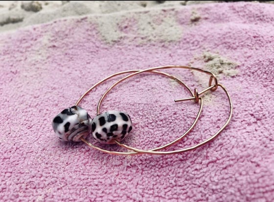 Image of Golden Puka Hoop Earrings 