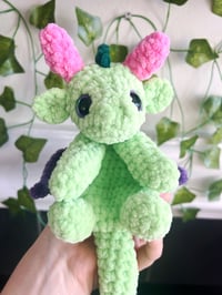 Image 2 of baby dragon snuggler