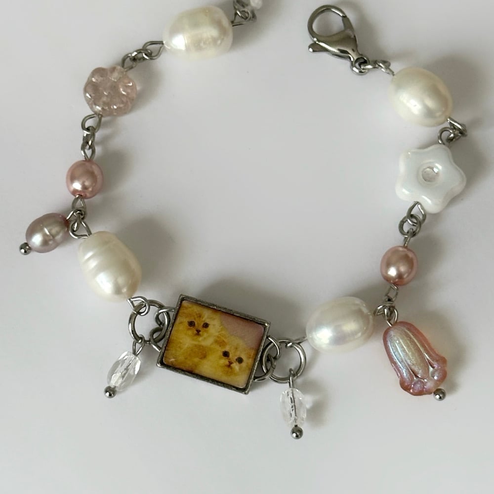 Image of vintage cat charm bracelets