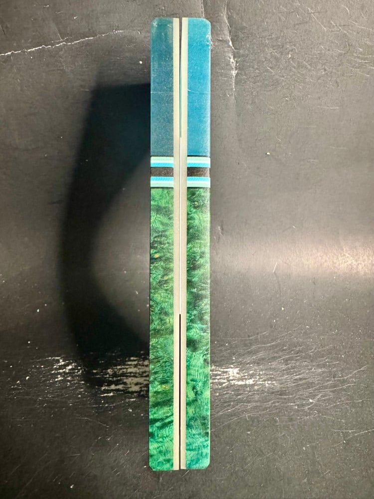 Image of @Kaoticartworks 3-D Resin & Teal Amboyna Burl GLOW Segmented Knife Scales