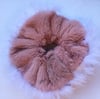 Dusky pink fur scrunchie with feather trim