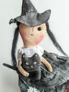 A witch and a cat