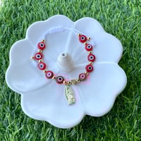Image 3 of Virgencita with evil eye