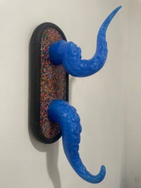Image 2 of Blue  tentacles on black oval base with sprinkles 