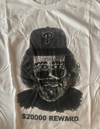 Image 2 of Jerry wearing a P hat shirt