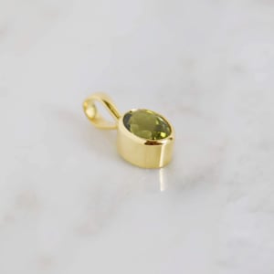 Image of Vietnam lime green Peridot oval cut 14k gold necklace