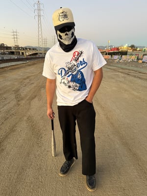 Image of bleed blue T