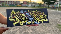 Negative letters on canvas. Original graffiti 