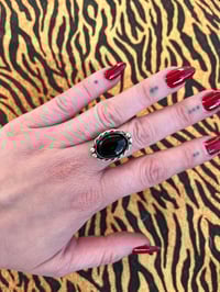 Image 1 of Ring oder Kette aus Sterlingsilber mit schwarzem Onyx 