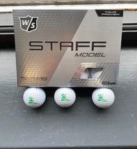 12 Wilson golf balls