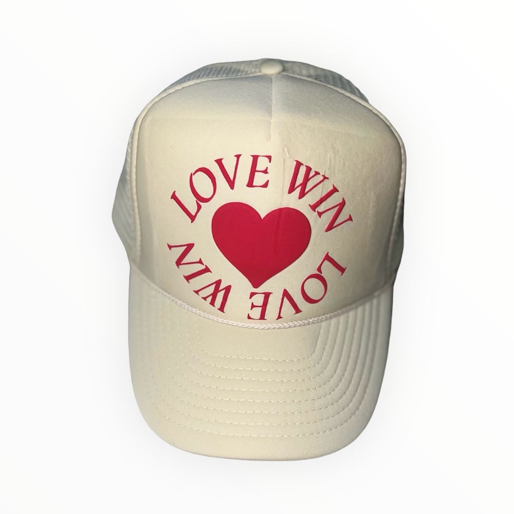 Image of Love Win trucker