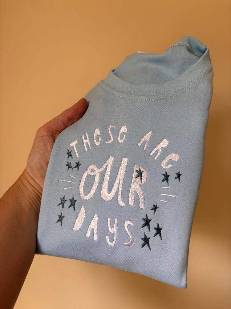 Image of 7-8 baby blue tee