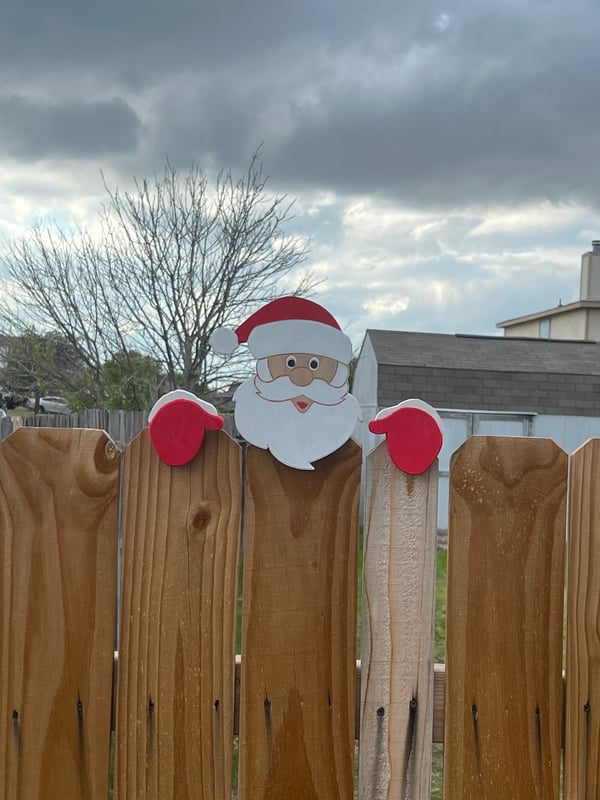 Image of Santa Peeping Over the Fence