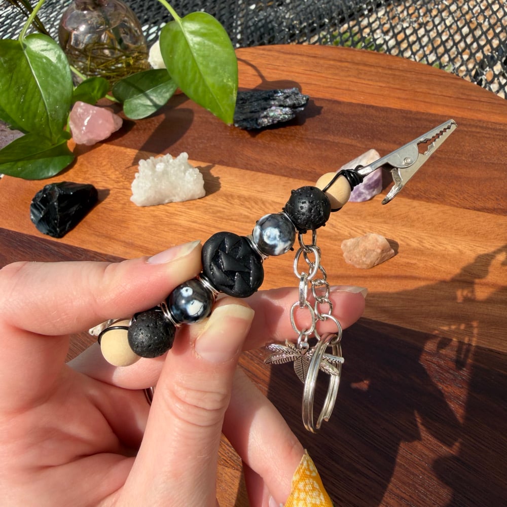 Image of midnight ash clip keychain