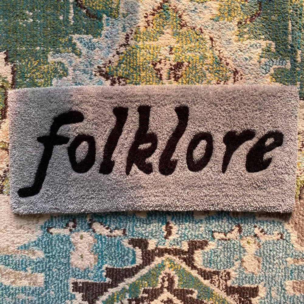 Image of folklore title wall rug