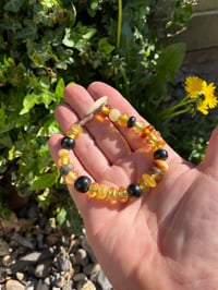 Image 5 of Amber and Jet mixed beads. 