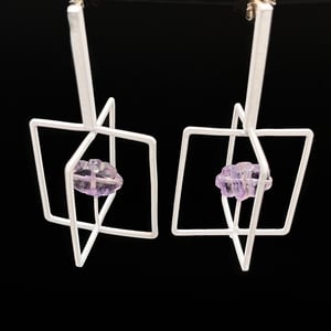 White cages with cloud earrings