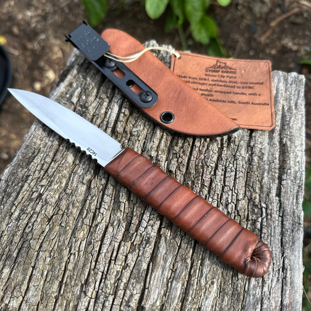 Image of 90mm clip point 14c28 leather