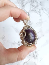 Image 1 of amethyst coil pendant