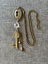 Image 2 of Steampunk repurposed necklace with key hole and religious key