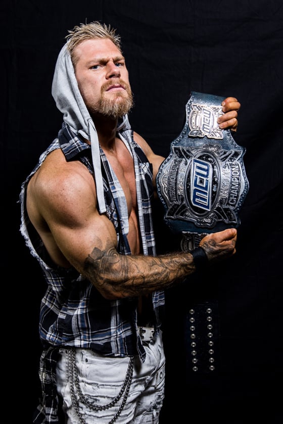 Image of Adam Brooks Intercommonwealth Champion 2025 Signed 8x10