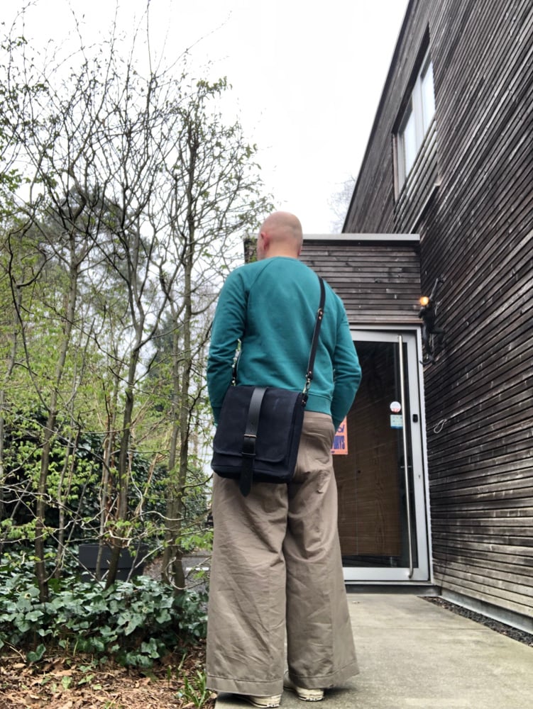 Image of Mens messenger bag in waxed canvas with leather adjustable shoulder strap and closing flap