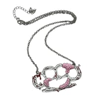 Image 1 of white zombie brass knuckle necklace 