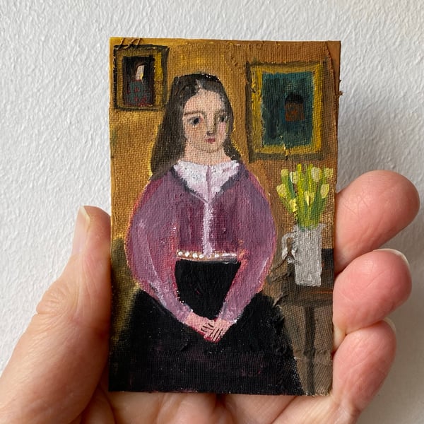 Image of girl in a violet jacket