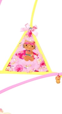 Image 2 of Tanned hellokitty going surfing